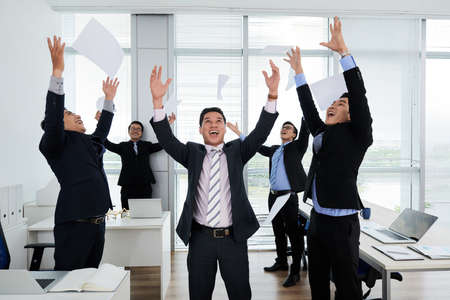 Asian Colleagues Celebrating Successの写真素材