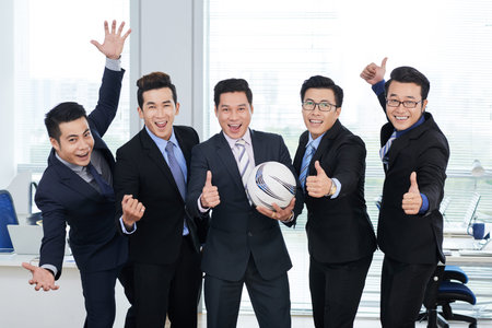 Football Fans at Open Plan Office