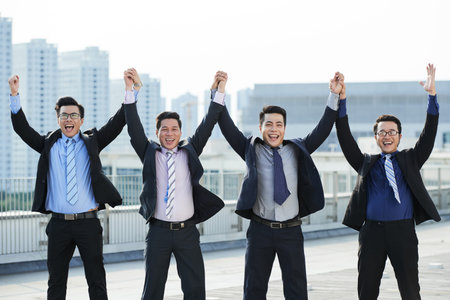 White Collar Workers Celebrating Project Completion