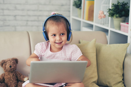 Little girl with laptop