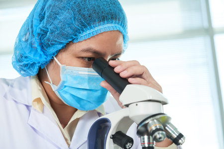 Biologist working in laboratory