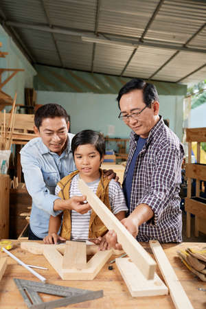 Family making furnitureの写真素材