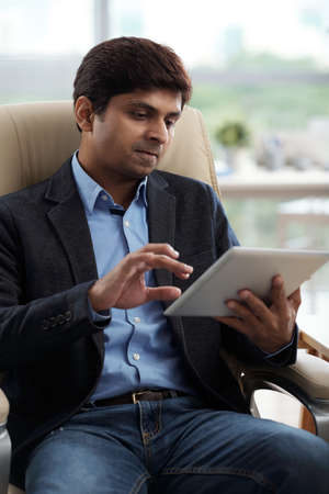 Businessman using applicationの写真素材