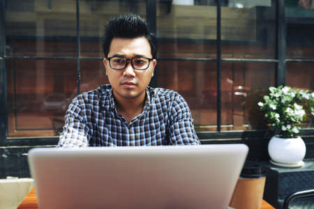 Man working on laptopの写真素材
