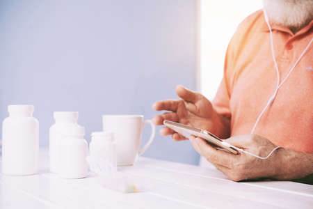 Man taking daily pillsの写真素材