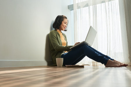 Young woman working on laptop