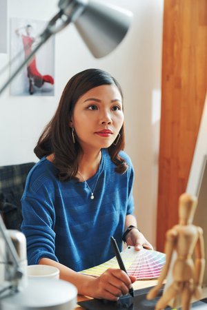 Designer busy with workの写真素材
