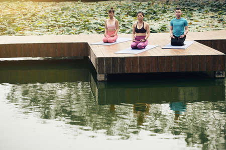 Practicing yogaの写真素材