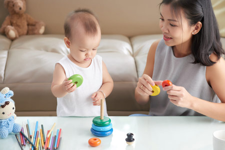 Mother and daughter playing together