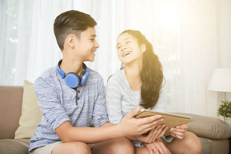 Teens watching funny videosの写真素材