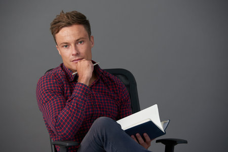 Man writing in diary