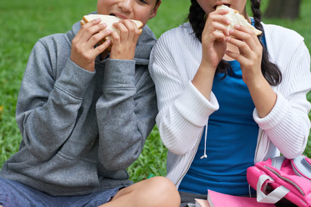 Children eating sandwichesの写真素材