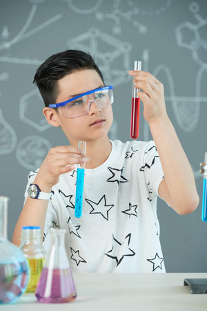 Kid learning chemistry