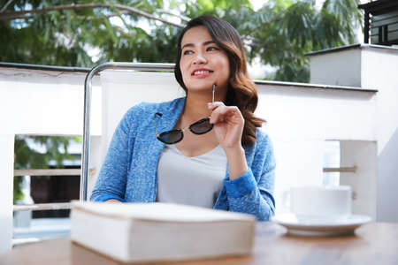 Pretty woman in cafeの写真素材