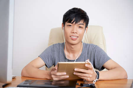 Student with tablet computerの写真素材