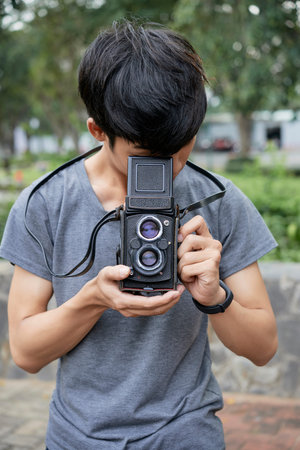 Teenager with camera