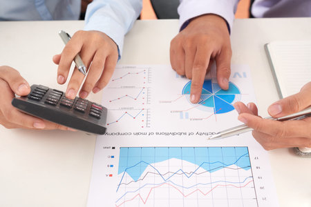 Business people discussing income