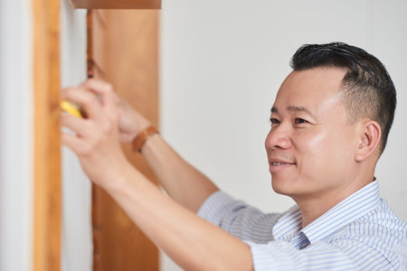 Carpenter making marks