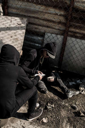 Counting stolen moneyの写真素材