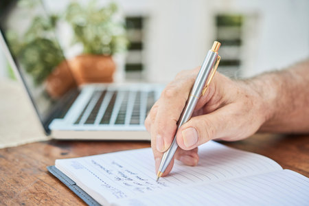 Aged man filling diary