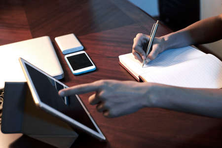 Female student doing homeworkの写真素材