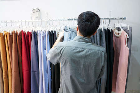 Man buying pantsの写真素材