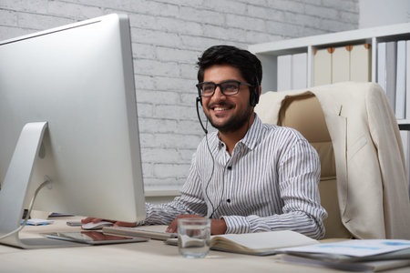 Positive Indian business executive