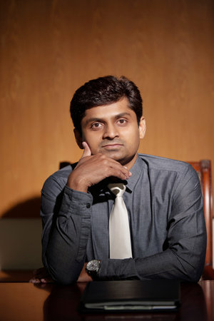 Pensive Indian entrepreneur
