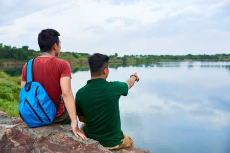 Hikers enjoying the viewの写真素材