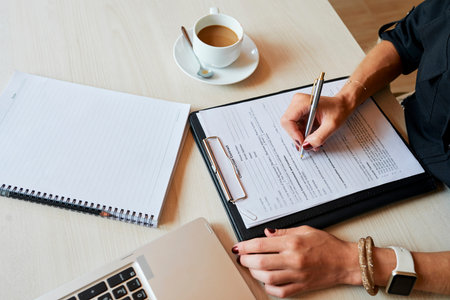 Female entrepreneur filling document