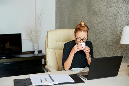 Businesswoman enjoying coffee