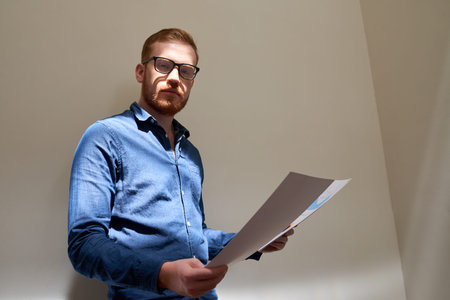 Handsome businessman with documents