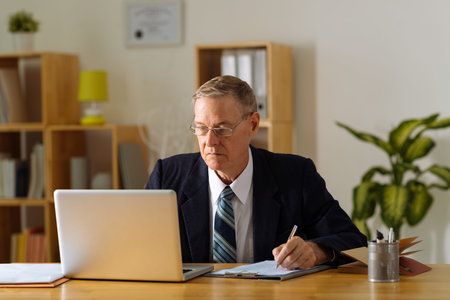 Senior businessman at work
