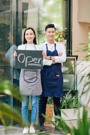 Young Vietnamese couple is happy to open cafe after long quarantine period
