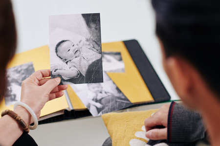 Mother showing old photo