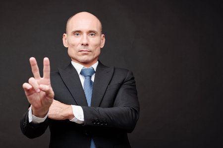 Politician showing peace gesture