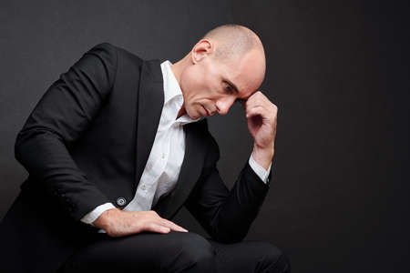 Pensive politician or businessmanの写真素材