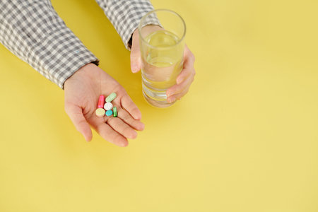 Taking handful of pills