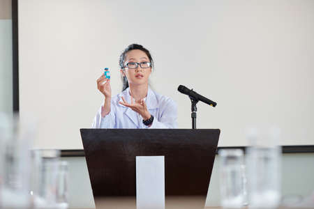 Researcher describing vaccine working principleの写真素材