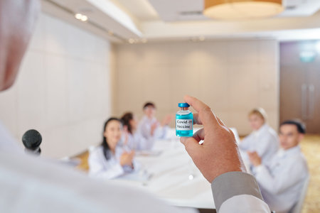 Pharmacologist presenting covid-19 vaccine