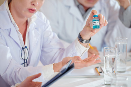 Scientists discussing vaccine testing