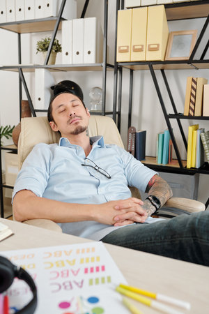 Sleeping graphic designer
