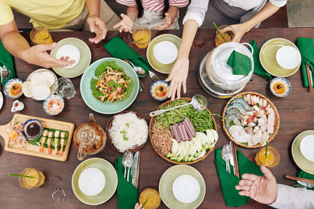 Family members eating dinnerの写真素材