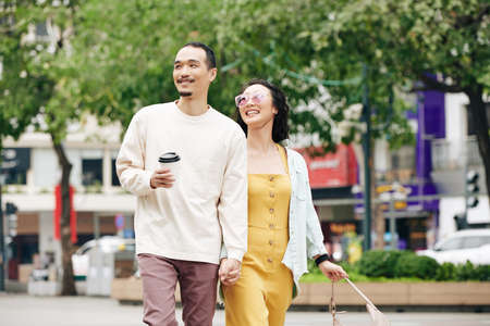 Chinese couple walkingの写真素材