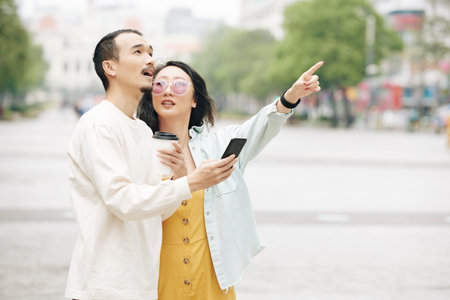 Chinese couple lost in cityの写真素材