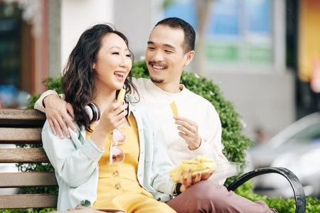 Couple eating street food