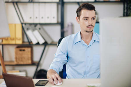 Businessman concentrated on workの写真素材