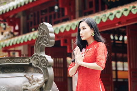 Young woman prayingの写真素材