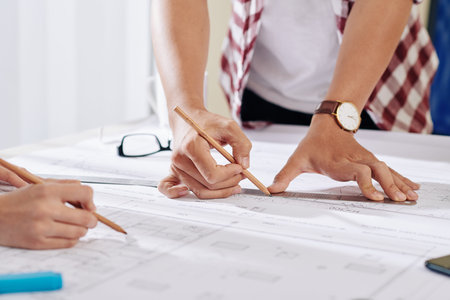 Architects working on construction plan