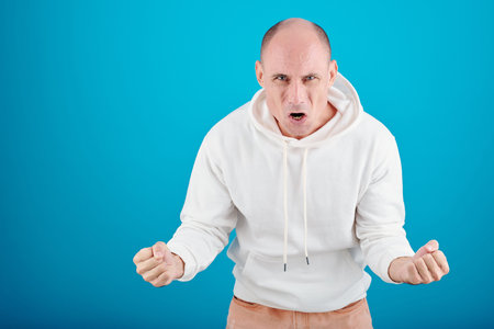 Angry emotional mature man